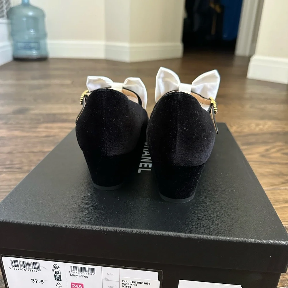 CHANEL Black velvet Mary Jane’s with White Bow